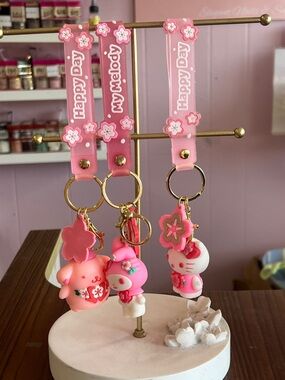 Sanrio Pink My Melody & Hello Kitty Sakura Keychain Trio